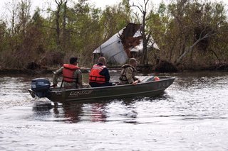 National Guardsmen conduct search operations in the aftermath of Hurricane Ida. Courtesy of the Department of Defense.